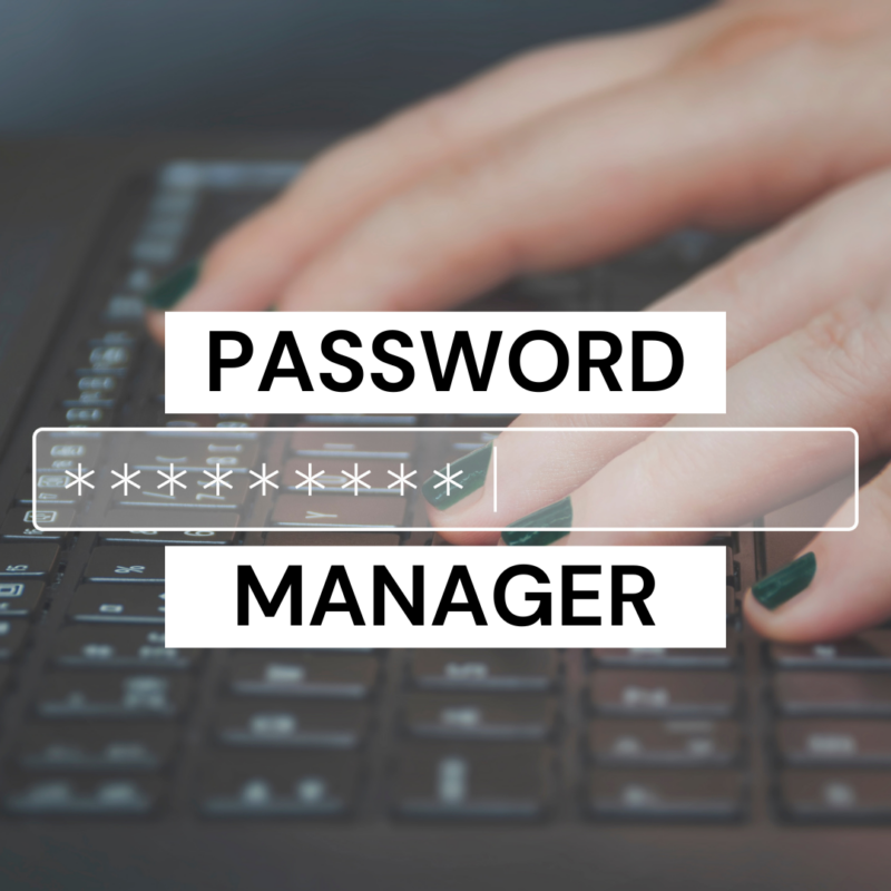A close-up of a hand on a keyboard with the words password and manager displayed over the