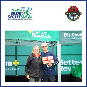 Winner of the Bill Harrop balloon safari on stage with a representative from Bill Harrops Orginal Balloon Safaris