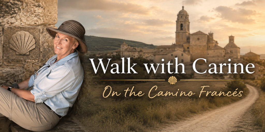 Wide cinematic banner featuring a smiling woman seated beside a stone Camino marker with a scallop shell symbol. A warm sunset landscape with a historic Spanish village and winding walking path stretches across the background. Elegant text reads “Walk with Carine – On the Camino Francés.”