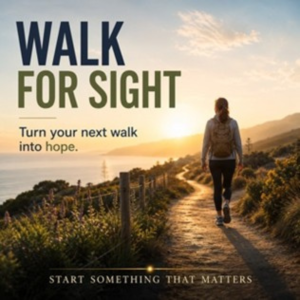 A person walking along a scenic coastal path at sunset, with the text: Walk for Sight — Turn your next walk into hope. Start Something That Matters.