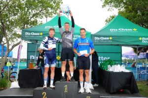 Participants standing on the podium