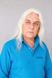 Anton van Rooyen wearing Retina golf shirt