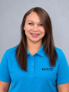 Lauren Jonas wearing a blue retina sa golf shirt