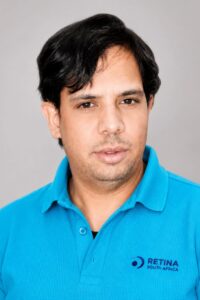 Renesh Singh wearing a blue Retina Golf Shirt